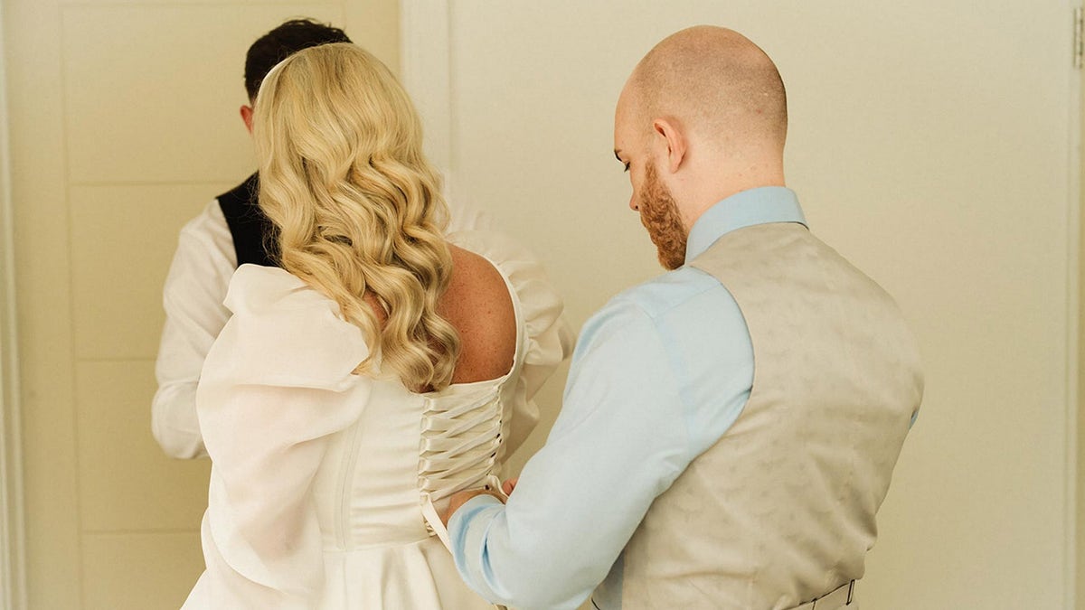 Bride wears $20K dream wedding dress that brother spent 120 hours making from scratch